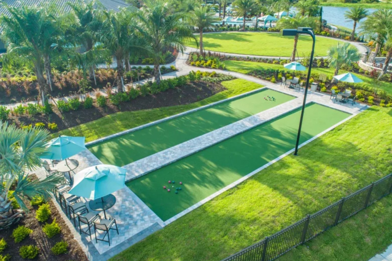 The community features a variety of outdoor sports facilities, including bocce ball, tennis, and pickleball courts. (Courtesy of Taylor Morrison)