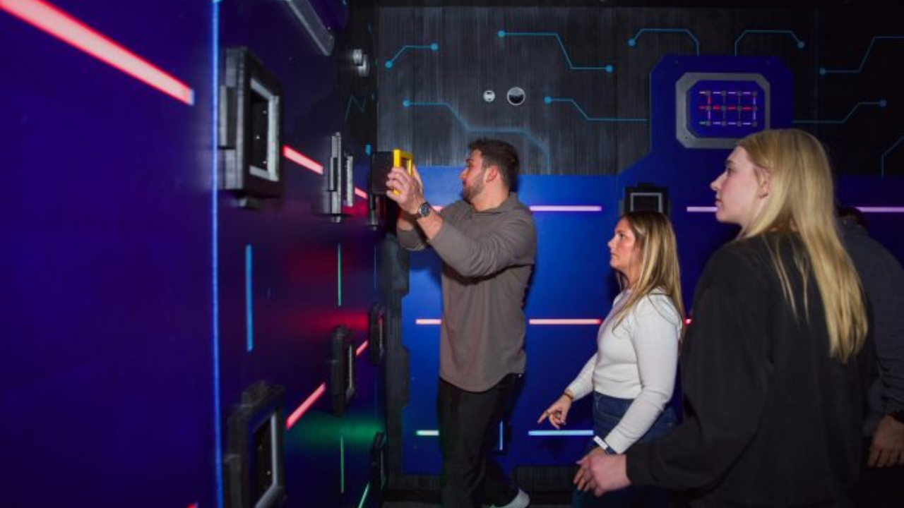 People participating in an interactive puzzle experience.