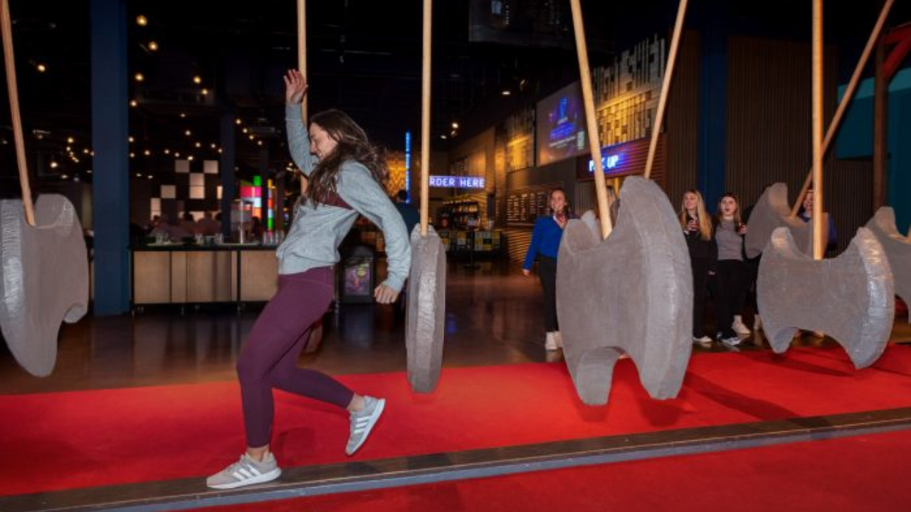 People participating in an interactive puzzle experience