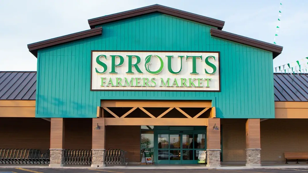 Interior of a Sprouts Farmers Market grocery store with a fresh produce section at the center of the layout