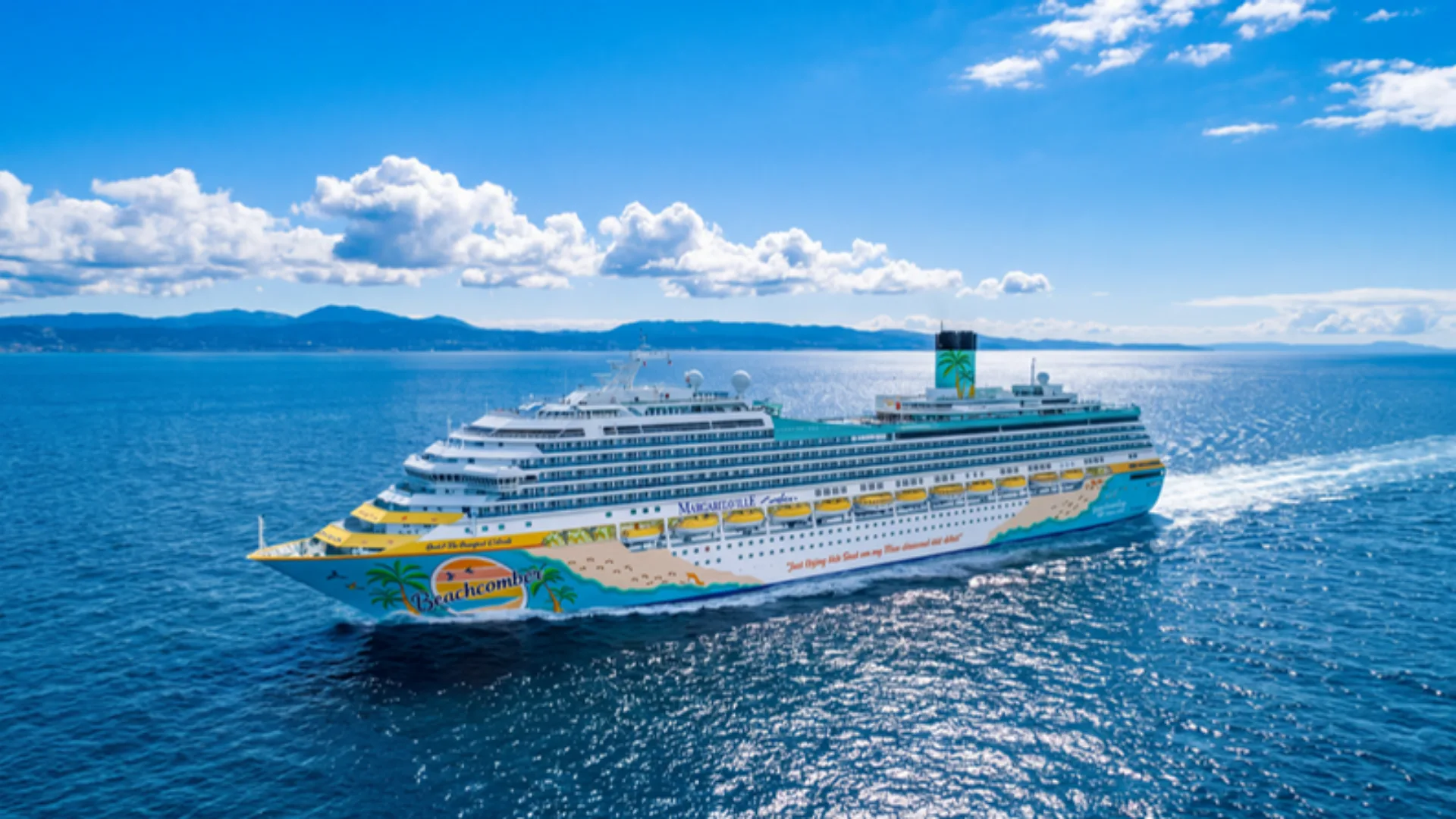 Margaritaville at Sea Margaritaville at Sea cruise ship sailing on open blue water