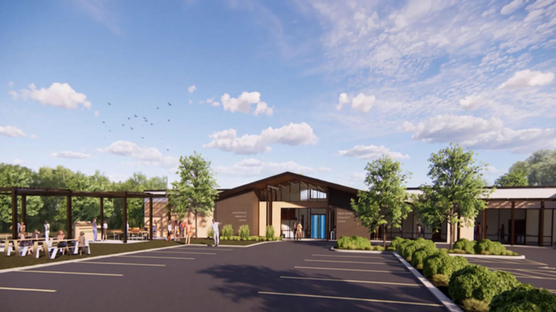 Tangelo Park Community Action Center Rendering of a single-story community center with covered outdoor pavilions and landscaping in Tangelo Park, Orlando